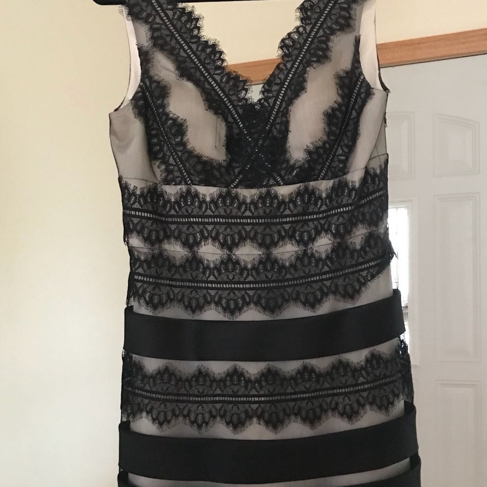 Black lace and cream cocktail dress